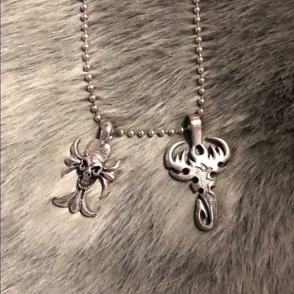Two necklace pendants with chain